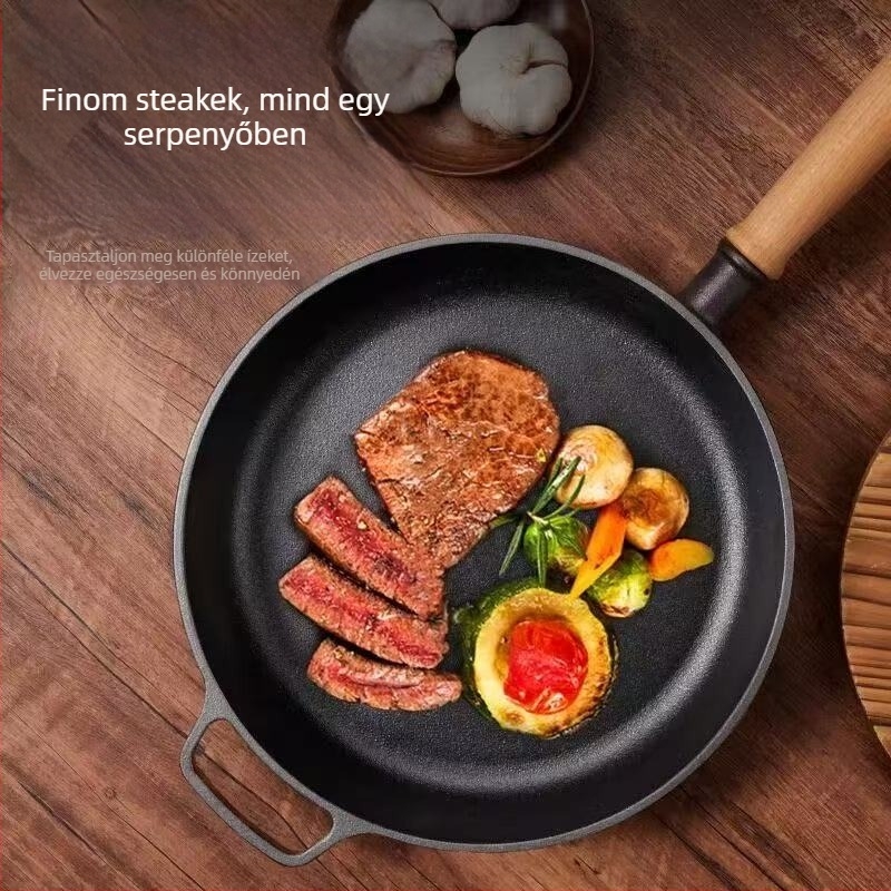 Öntöttvas lapos aljú serpenyő, bevonat nélküli, vastag falú, fa fogantyúval, tojásokhoz, palacsintához és steakhez.