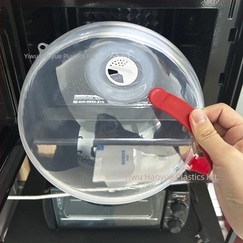 Kör alakú, átlátszó műanyag mikrohullámú sütő tálfedő fogantyúval, fröccsenés- és olajálló