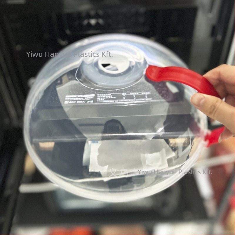 Kör alakú, átlátszó műanyag mikrohullámú sütő tálfedő fogantyúval, fröccsenés- és olajálló