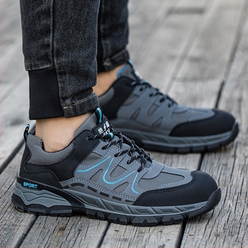 Ütésálló és átszúródás elleni biztonsági cipő, anyag: microfiber bőr + vászon, alacsony felsőrész, orrvédő műanyag-vas