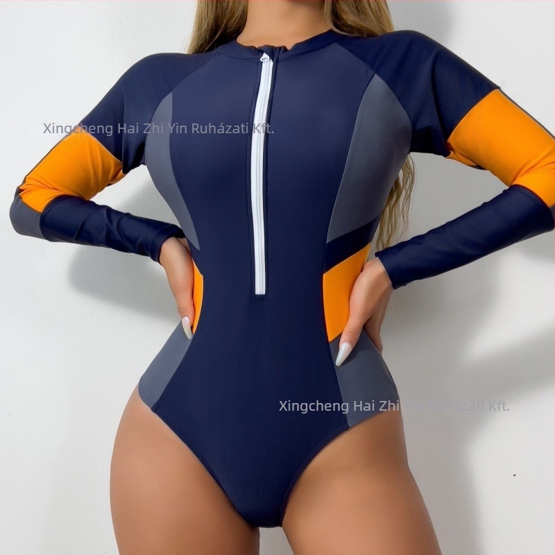 Női hosszú ujjú egyrészes fürdőruha szörfözéshez – poliészter anyag; nylon/spandex keverék; 275 g; bélés poliészter-spandex kombinációval