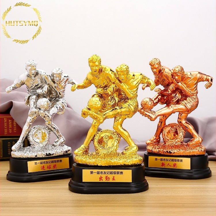 Műgyanta futballtrófea arany bevonattal, logónyomtatás elérhető, nettó tömeg 900 g, márka HUTSYMQ