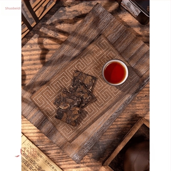 Vintage stílusú mini összecsukható képernyő fotórekvizit, kézzel készített sütemények és tealevelek hátterével