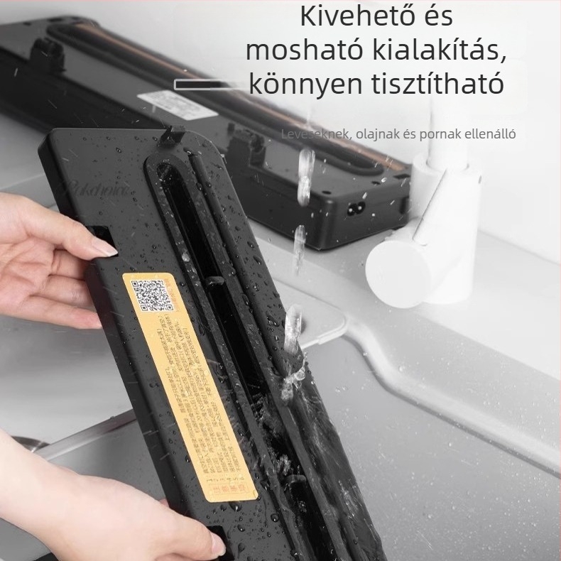 Kompakt otthoni vákuumzáró készülék élelmiszerekhez, teljesen automata, műanyag ház, vágóval és lila fénnyel történő sterilizálással