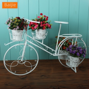 Kovácsoltvas kerékpár alakú kerti virágtartó — pásztorális stílus, többszintes kivitel, absztrakt megjelenés (Anyag: vas; Stílus: pásztorális; Gyártás: polírozás, félig kézi és félig mechanikus; Márka: Hundred Realms)