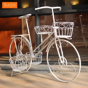 Kovácsoltvas kerékpár alakú kerti virágtartó — pásztorális stílus, többszintes kivitel, absztrakt megjelenés (Anyag: vas; Stílus: pásztorális; Gyártás: polírozás, félig kézi és félig mechanikus; Márka: Hundred Realms)