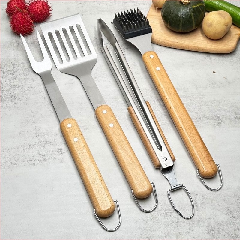 Rozsdamentes acél BBQ eszközkészlet bükkfa fogantyúval, 4 darabos készlet: spatula, grillfogó, villa, kés