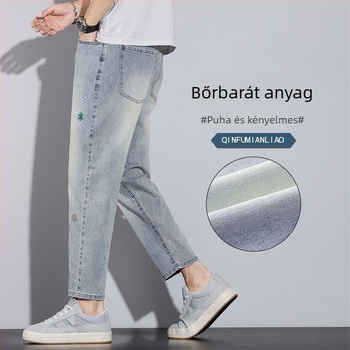 Farmernadrág, cropped szabású egyenes szárú fazon, középmagas derekú, pamut-keverék mikroszilárd rugalmassággal (67% pamut, 32,2% poliészter, 0,8% spandex), cipzár