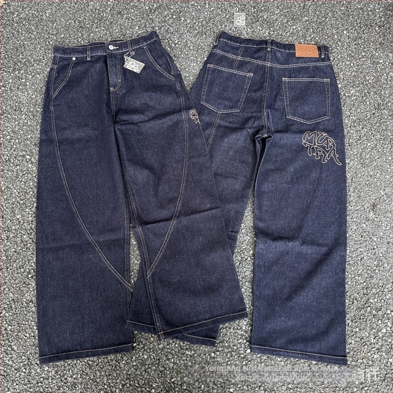 Laza szabású farmernadrág mosott denimből, középmagas derékkal, gombos zárás, egyenes szárú, 90% pamut