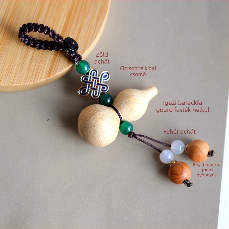 Autókulcs-gyűrű barackfa anyagból, Mu ran márka, modell 888