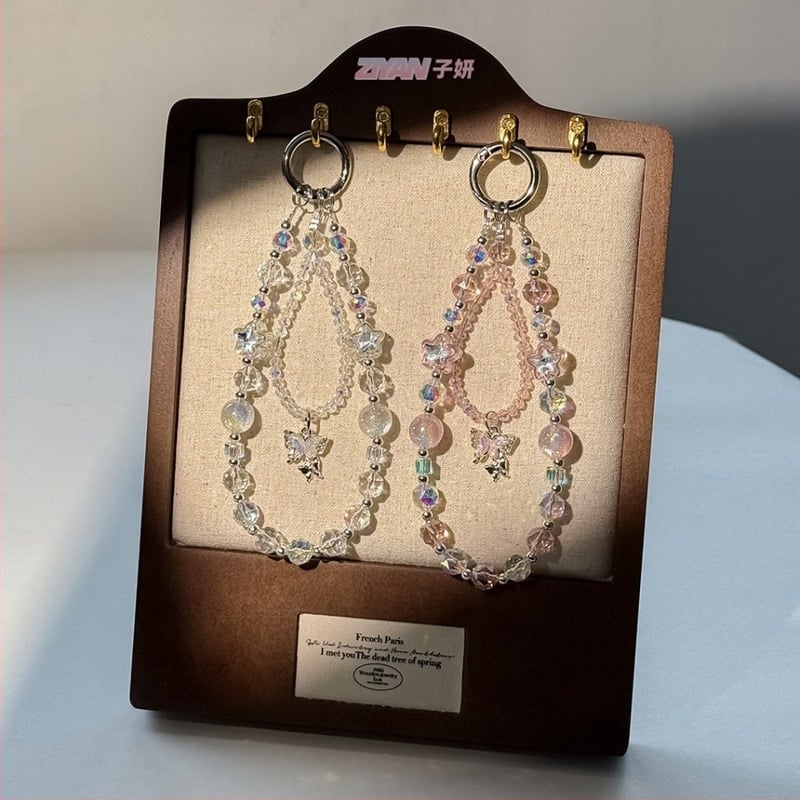 Könnyű luxus telefontartó lánc kristály pillangó gyöngyökkel; kézzel készített gyöngyök; kristály anyag; fényűző stílus; minta csillagok és hold