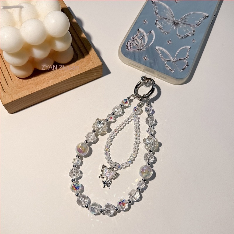 Könnyű luxus telefontartó lánc kristály pillangó gyöngyökkel; kézzel készített gyöngyök; kristály anyag; fényűző stílus; minta csillagok és hold