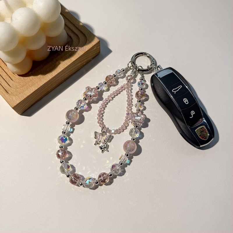 Könnyű luxus telefontartó lánc kristály pillangó gyöngyökkel; kézzel készített gyöngyök; kristály anyag; fényűző stílus; minta csillagok és hold