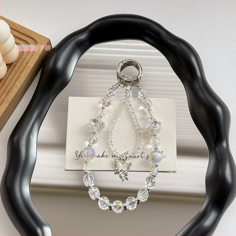 Könnyű luxus telefontartó lánc kristály pillangó gyöngyökkel; kézzel készített gyöngyök; kristály anyag; fényűző stílus; minta csillagok és hold