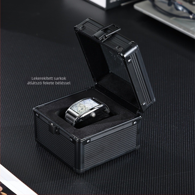 Óra kiállító és tároló doboz alumínium ötvözet kerettel, EVA és velúr béléssel, ABS felülettel, üvegfedél, kapacitás: 1 óra