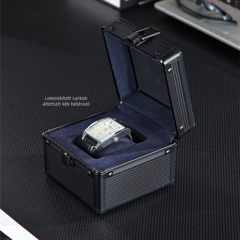 Óra kiállító és tároló doboz alumínium ötvözet kerettel, EVA és velúr béléssel, ABS felülettel, üvegfedél, kapacitás: 1 óra