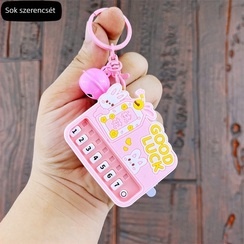 Világító mini zongora kulcstartó — oktató kézben tartható zenei játék, műanyagból