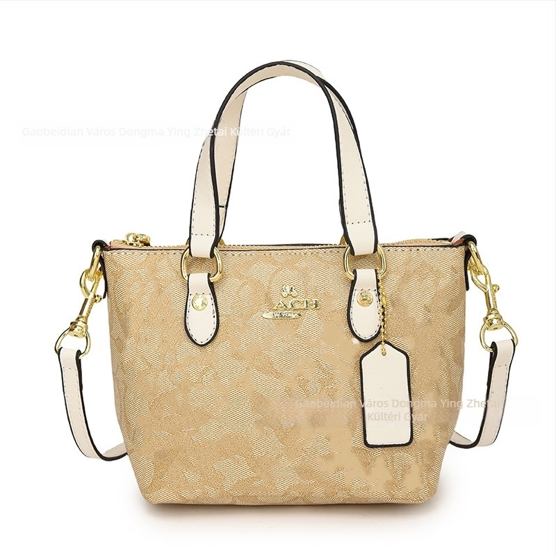 PU Tote táska, vízszintes négyszög alakú forma, cipzáras nyitás, poliészter bélés, belső zsebek: cipzáras zseb, telefonzseb, szendvicszseb — Nyár 2024