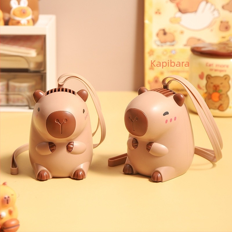 USB töltésű nyakventilátor, beépített akkumulátor 100-300 mAh, 2 lapát, capybara dizájn, zaj 70 dB vagy több, 3.7V 5W (USB töltés, akku 100-300 mAh, 3.7V, 5W, 2 lapát)