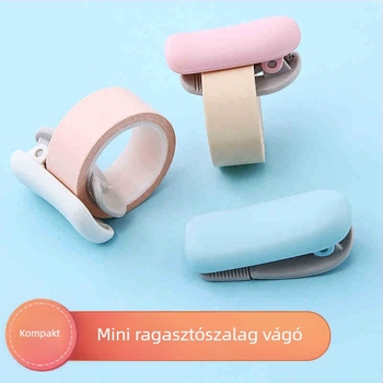 KOKUYO Guoyu Karu-Cut mini kézi ragasztószalagvágó, rozsdamentes acél test, modell T-SM401LB, méretek 40×20×20 mm, szalag szélesség legfeljebb 25 mm