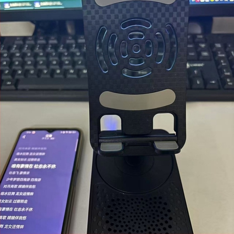 Telefon-tartó Bluetooth hangszóróval — mindent egyben filmnézéshez, zenehallgatáshoz és töltéshez