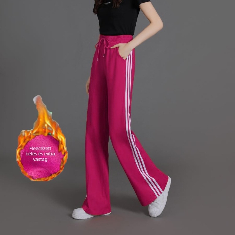 Női magas derekú, enyhén szélesedő sportnadrág három csíkkal, viszkóz szálas anyagból