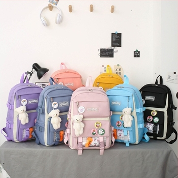 Nylonból készült iskolai hátizsák gyerekeknek, légáteresztő, kopásálló, bővíthető és terheléscsökkentő funkciókkal; görbült vállpántokkal és párnázott hátsó része