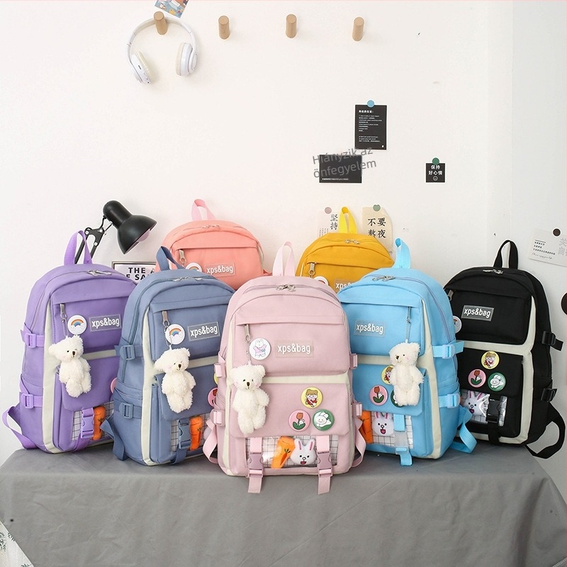 Nylonból készült iskolai hátizsák gyerekeknek, légáteresztő, kopásálló, bővíthető és terheléscsökkentő funkciókkal; görbült vállpántokkal és párnázott hátsó része