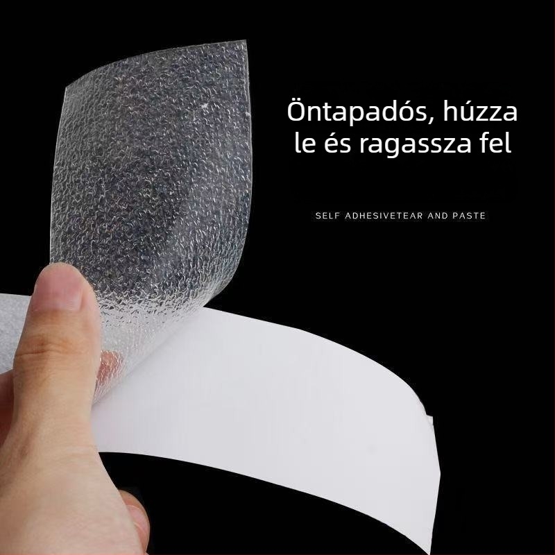 Átlátszó PEVA csúszásgátló szalag fürdőszobába, kádhoz, csempéhez, lépcsőkhöz és padlóhoz; öntapadós, vízálló, PVC hátlap, 0,8 mm vastagság.