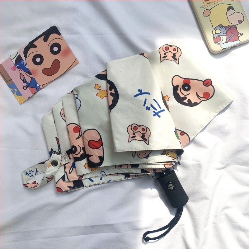 Háromrészes Shin-Chan mintás esernyő, UPF>50 napvédelem, 8 bordás rostos váz, acél tengely.