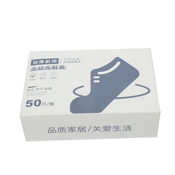 Egyszer használatos cipővédők, falra szerelt adagolóval, textil anyag, csúszásmentes, 4 g vastagság, testreszabott mintával és nyomtatott logóval, 50 db dobozonként