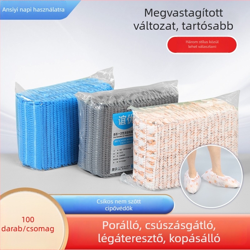 Egyszer használatos, nem szövött anyagból készült cipővédő, megvastított és megnagyobbított, csúszásmentes és porvédett, beltéri műhelyekhez, szalag típusú, biológiailag lebomló