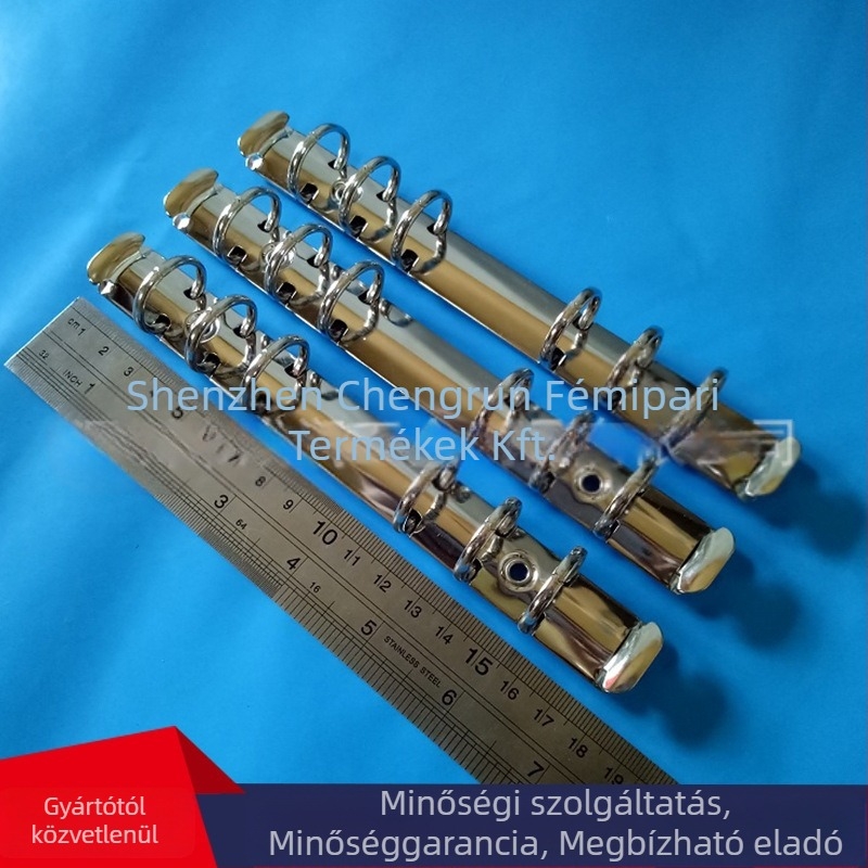 6 lyukú O-típusú fém iratrögzítő, irodai lapokhoz; belső átmérő 20 mm, alap szélesség 20 mm.