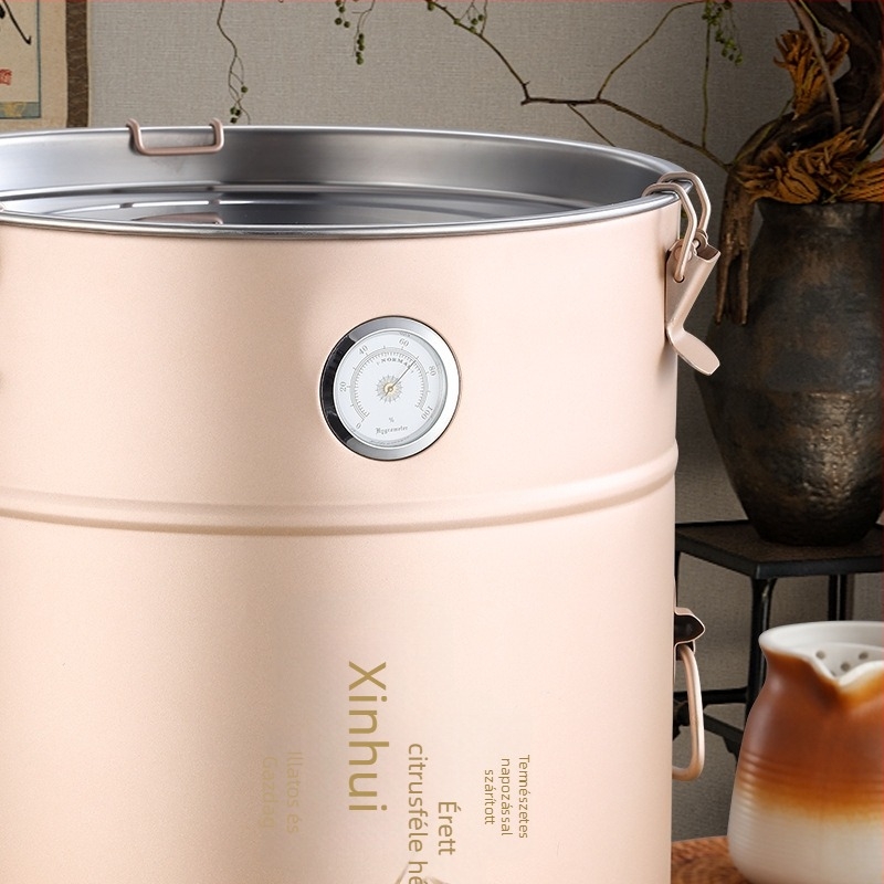 Rozsdamentes acélból készült kerek tea-tároló nedvességmérővel, 5L+ kapacitás, nedvességálló zárás, frissesség megőrzése, kínai stílus.