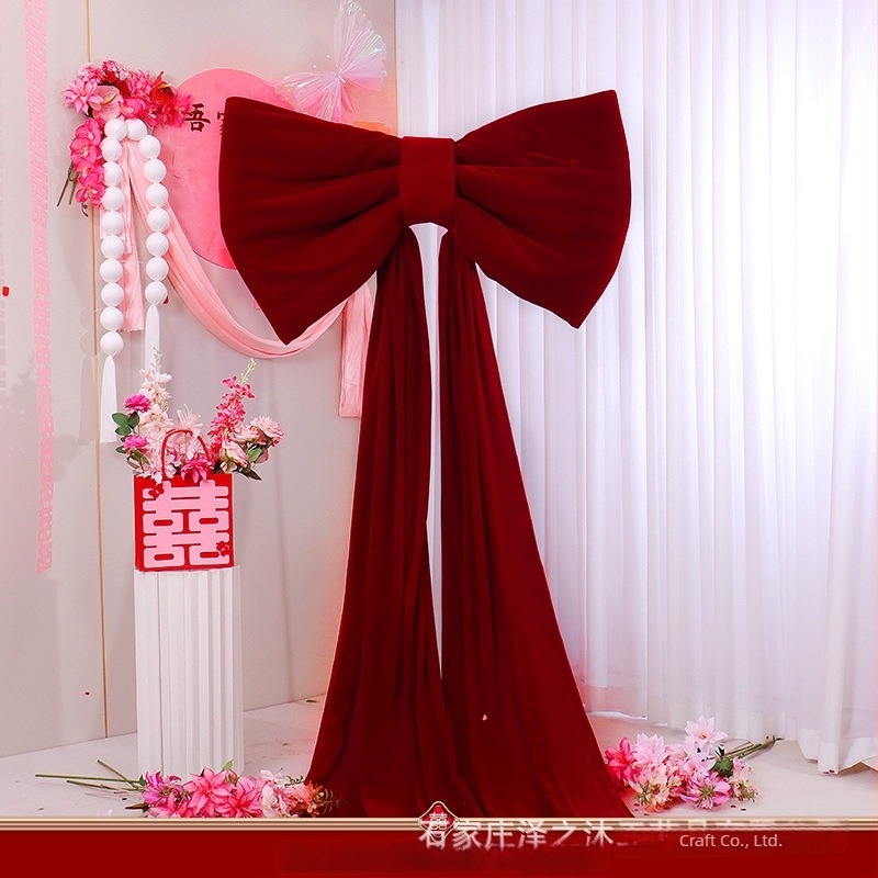 Nagy flockált szövetből készült masni, késztermék esküvői dekorációhoz