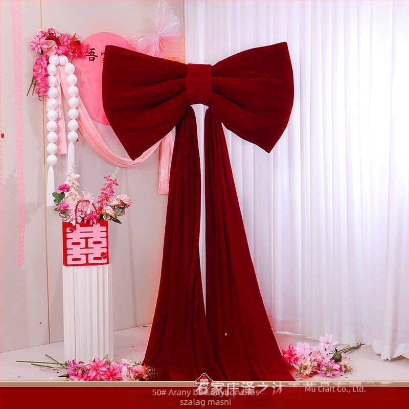 Nagy flockált szövetből készült masni, késztermék esküvői dekorációhoz