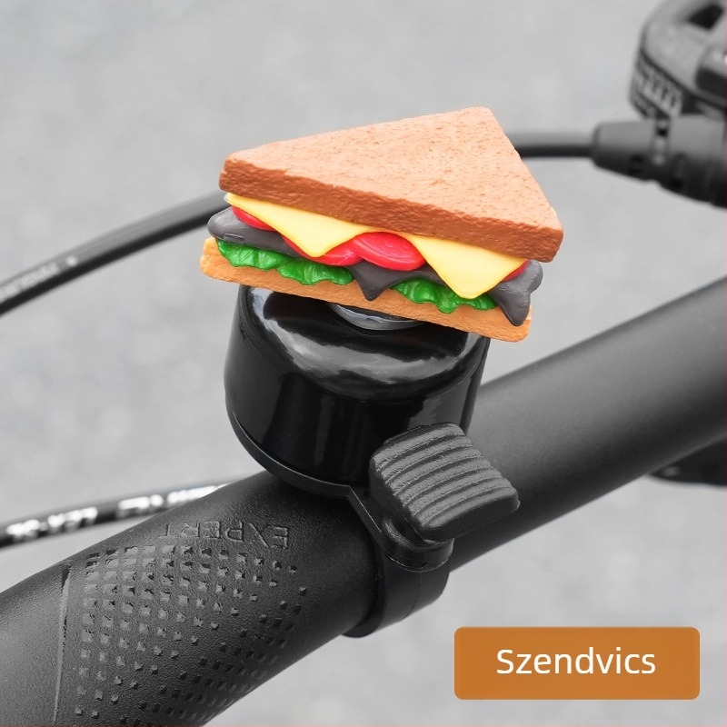 Vasból készült kerékpár csengő burger motívummal és sült krumpli-szendvics dekorációval