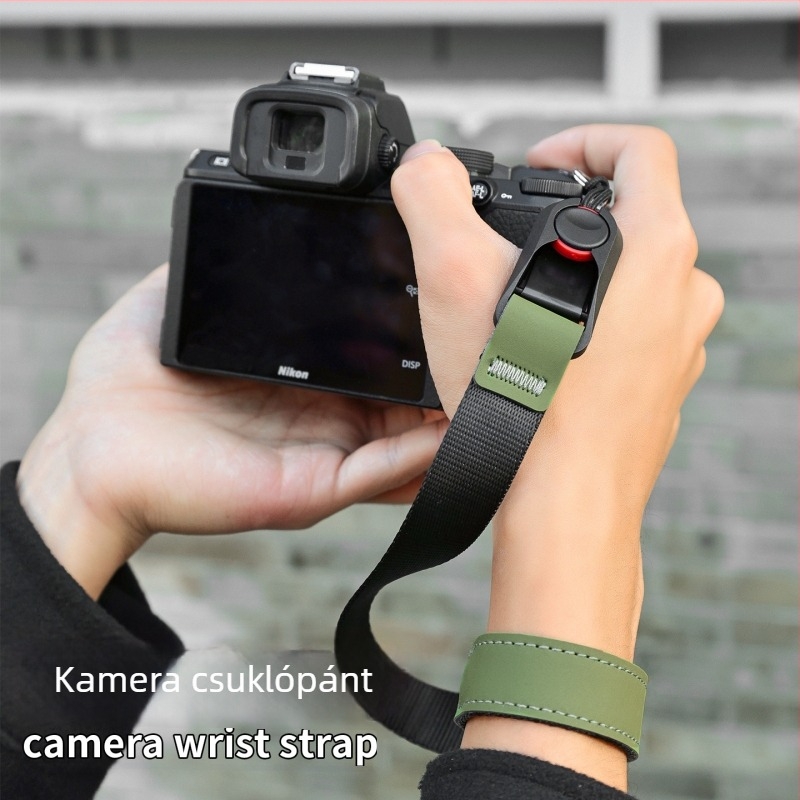 Kamera csuklópánt P-V1 — gyorsoldalas, mágneses, állítható; DSLR és mirrorless kamerákhoz; Anyag: webbing + bőr + ABS; Tömeg: 50 g