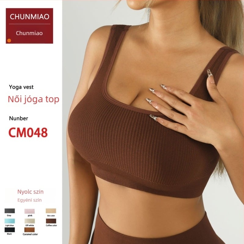 Női jóga felső mellkasbetéttel — varrás nélküli, gyorsan száradó, karcsú fazon (Összetétel: Nylon 92% + Spandex 8%; Nedvesség-elvezető; Modell: Slim; Hossz: Chest-length; Mellkasbetétet tartalmaz)