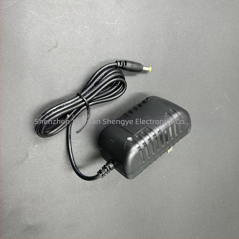 12V 2A kapcsolóüzemű tápegység portatív DVD-hez és mobil TV-hez — 24W
