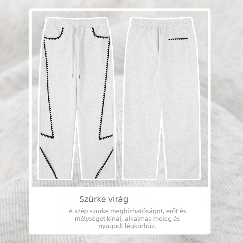 Őszi 2025-ös kiadás: bontott szabású pamut tréningnadrág, shell hímzés, color-blocking, egyenes szabás.