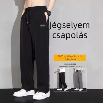 Sportos hétköznapi nadrág egyenes szabás, vékony poliészter anyag, lélegző és gyorsan száradó, középmagas derék, nyári viselet.