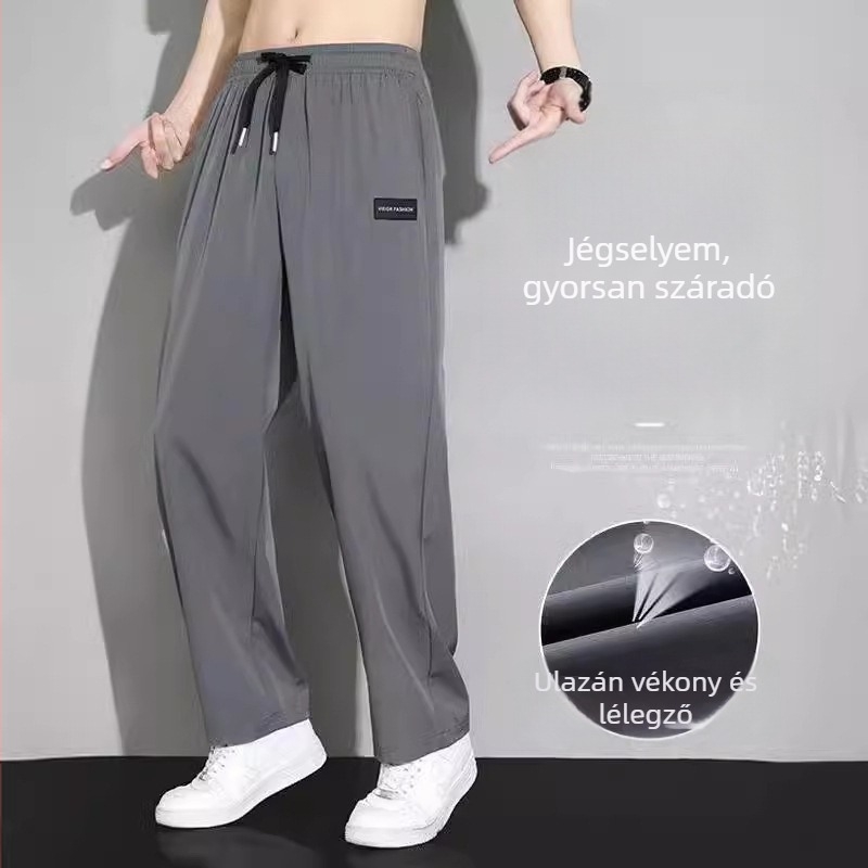 Sportos hétköznapi nadrág egyenes szabás, vékony poliészter anyag, lélegző és gyorsan száradó, középmagas derék, nyári viselet.