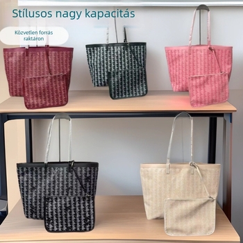 PU anyagú tote táska, nagy kapacitás, cipzáros záródás, belső cipzáras zseb és telefontartó zseb, dupla vállpánt