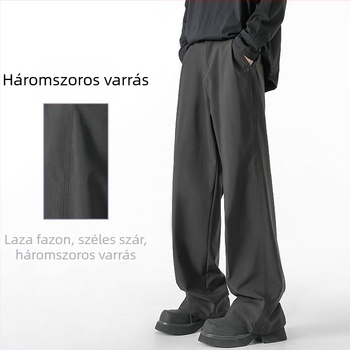 Fekete férfi nadrág, széles szabású, hosszú, a padlóig érő, drapírozott siluettel, elegáns mindennapi viselet, őszi-téli 2025