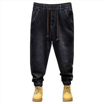 Férfi denim jogger nadrág — laza szabás, harém stílus, középmagas derék, húzózsinórral és elasztikus derékkal, pamut/poliészter/elasztán keverék, őszi 2025