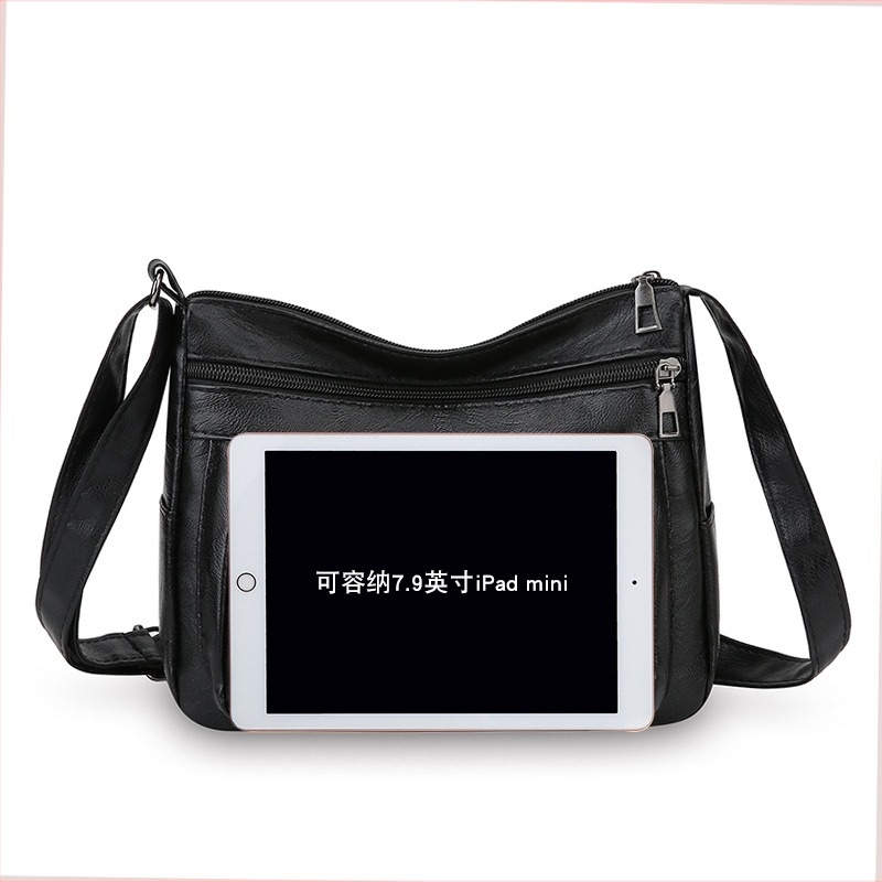 PU bőrhatású válltáska, nagy kapacitású, többszintes kialakítás, cipzáras zárás, belső zseb