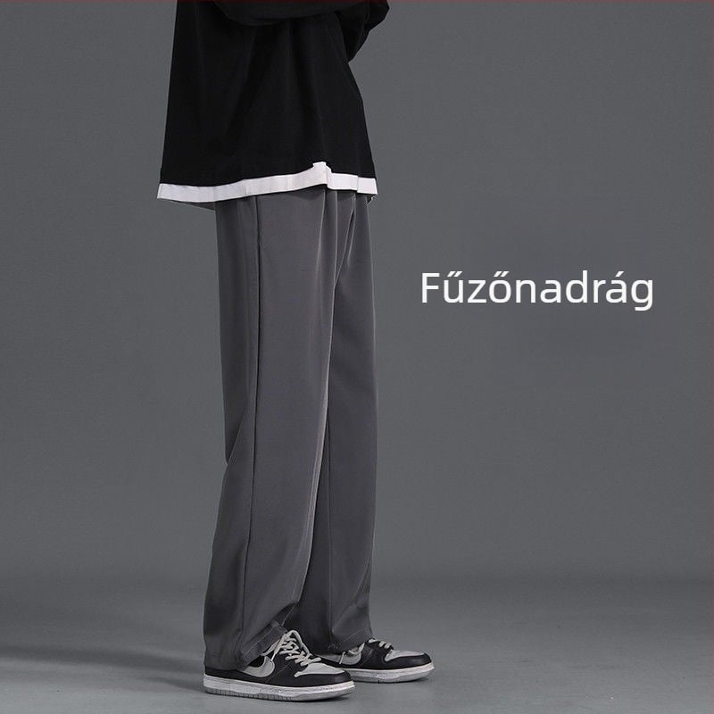 Férfiaknak casual nadrág, laza szabású, széles szárú, rövidre vágott egyenes szabás, poliészter, tavasz–ősz viselésre.