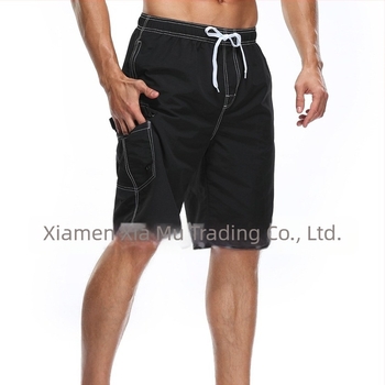 Férfi strandnadrág, gyorsan száradó poliészter anyagból, egyenes szabás, több zseb