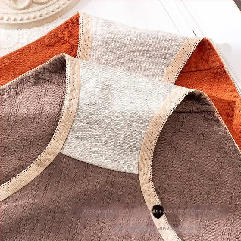 Női pamut alsónemű középmagas derekú, antibakteriális és lélegző jacquard anyagú, crotch belső rész 100% pamut, külső anyag 90–95% pamut